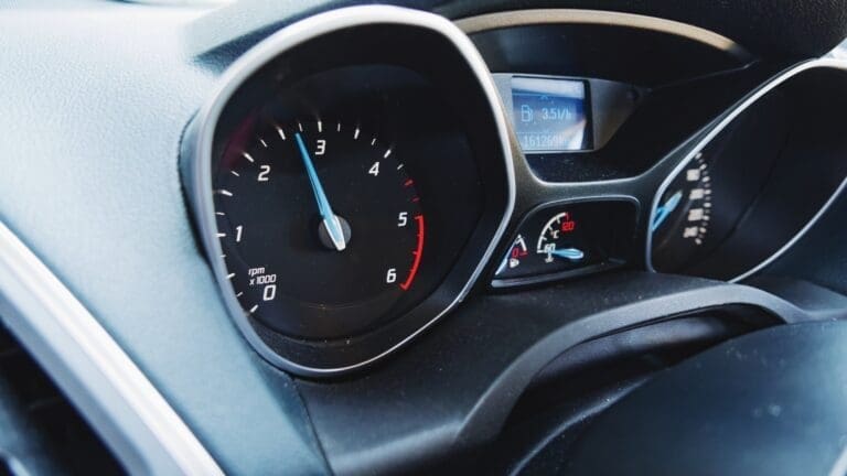 Close-up photo of Gauges and dashboard in ford car.