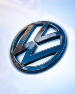 silver volkswagen emblem on white surface